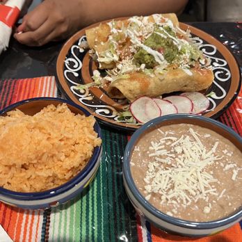 El Canario Carnitas - Potato tacos with sides of rice and beans - Mexican Near Me - Temecula, California El Canario Carnitas - Potato tacos with sides of rice and beans - Mexican Near Me - Temecula, California