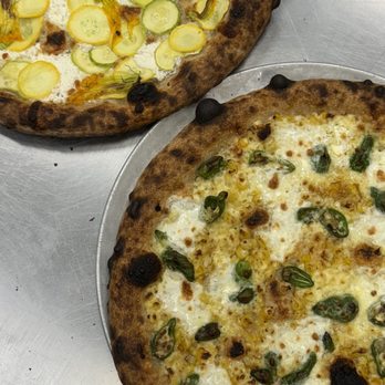 Folk - Folk Restaurant has the best Sourdough pizza in East Nashville - New American Near Me - Nashville, Tennessee