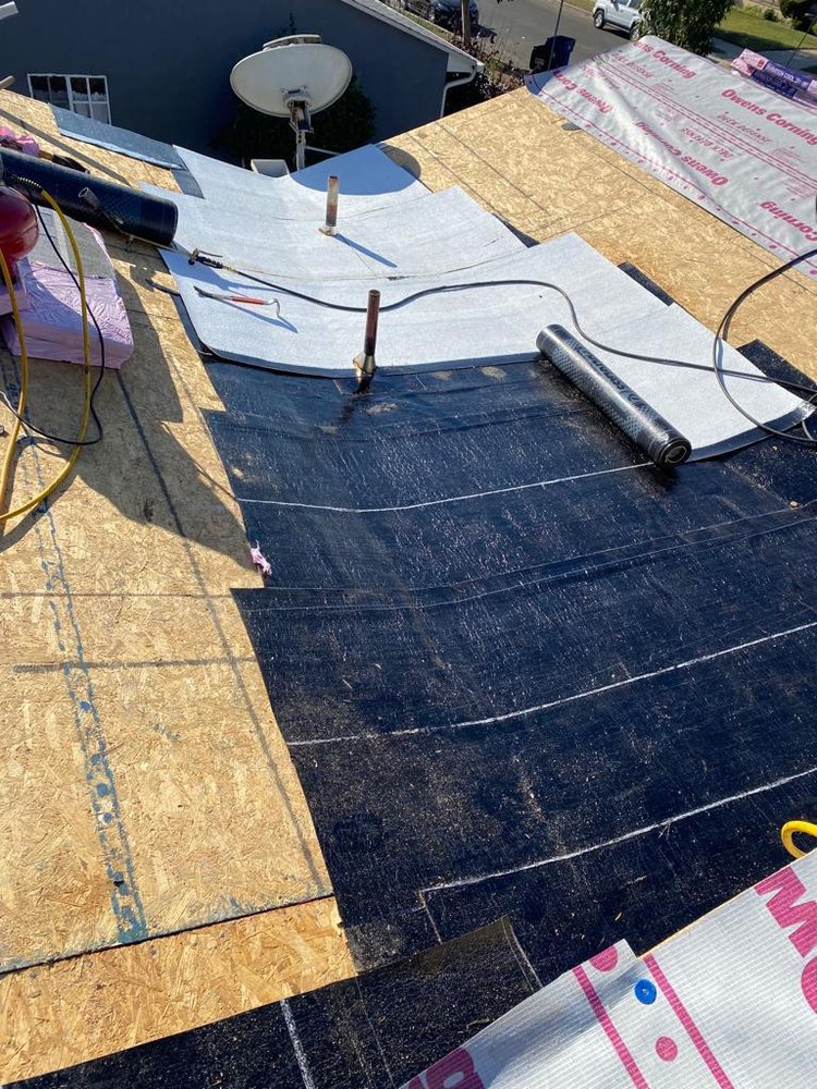 Slide of Top Roofing Inc