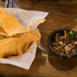 Tres Amigos - Chips (not overly salted) with hungos (mushrooms) salsa and red salsa