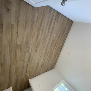 Green Oaks Flooring - a wood paneled wall - Flooring Near Me Green Oaks Flooring - a wood paneled wall - Flooring Near Me