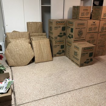 Seven Brothers Moving - Wrapped framed art and full boxes ready to be loaded into the truck! - Movers Near Me Seven Brothers Moving - Wrapped framed art and full boxes ready to be loaded into the truck! - Movers Near Me