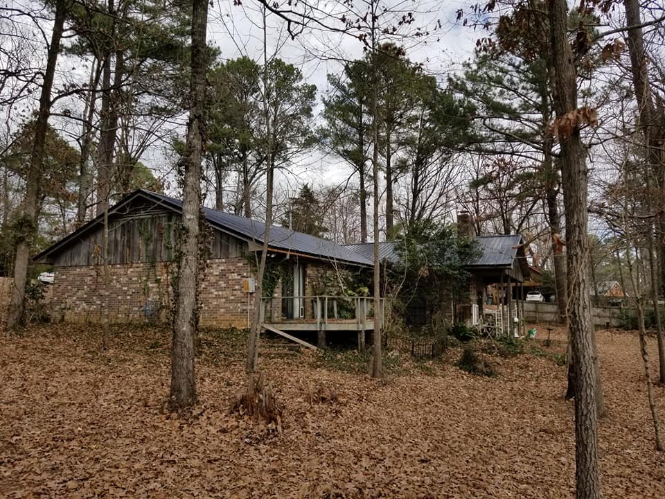 Slide of Metal Roofing Contractors