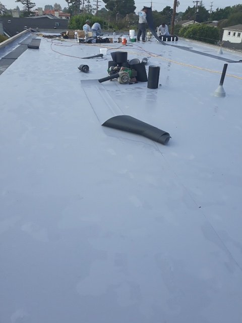 Slide of Coastal Roofing