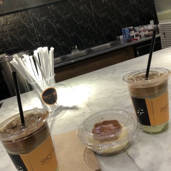 Shotted Specialty Coffee - Lotus Cheesecake Iced Pistachio Latte - Coffee & Tea Near Me - Tysons, Virginia Shotted Specialty Coffee - Lotus Cheesecake Iced Pistachio Latte - Coffee & Tea Near Me - Tysons, Virginia