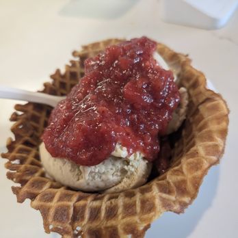 Fat Cat Creamery - 2 scoops of PB & Strawberry Jam in Waffle Cone with Strawberry Mash topping - Desserts Near Me - Houston, Texas