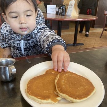 The Original Pancake house - Baby eating pancakes - Pancakes Near Me - Grapevine, Texas The Original Pancake house - Baby eating pancakes - Pancakes Near Me - Grapevine, Texas