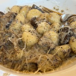 Gnocchi with mushrooms and truffle oil. Yummy Gnocchi with mushrooms and truffle oil. Yummy