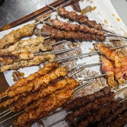 Kochi Maru - Top left: chicken; Top right: lamb; Center left: pork belly; Center right: bacon wrapped mushroom; Bottom: beef