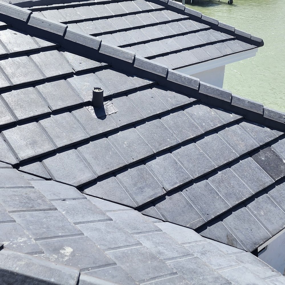 Slide of Reyes Roofing