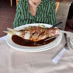 Whole steamed snapper with black bean sauce.