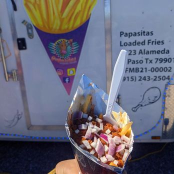 Papasita's Loaded Fries - a hand holding a cone of fries - Food Trucks Near Me - El Paso, Texas Papasita's Loaded Fries - a hand holding a cone of fries - Food Trucks Near Me - El Paso, Texas