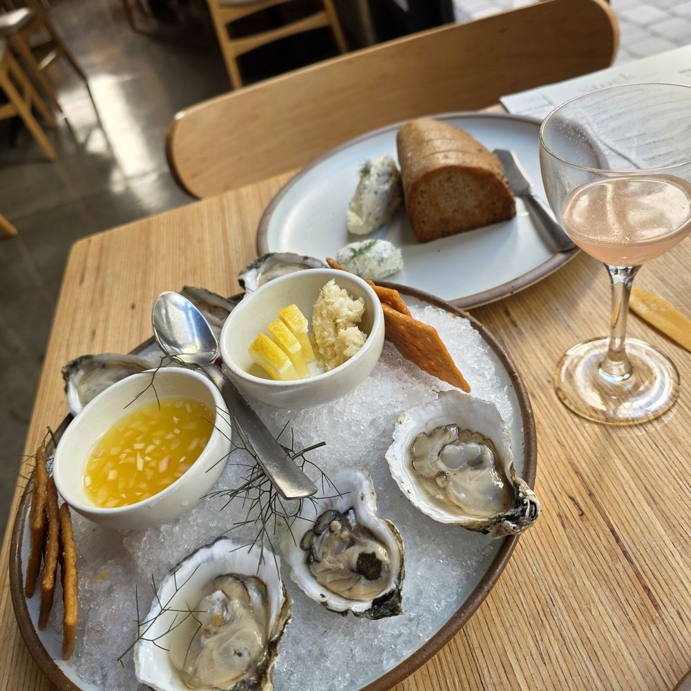Stock Cafe - My Virginia Oysters appetizer together with the Bread & Butter, and my Hemingway Daiquiri Mocktail. - Cocktail Bars Near Me - Roanoke, Virginia Stock Cafe - My Virginia Oysters appetizer together with the Bread & Butter, and my Hemingway Daiquiri Mocktail. - Cocktail Bars Near Me - Roanoke, Virginia