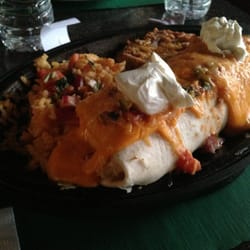 Dooley's Pub & Eatery - Daily special - chicken burrito with refried beans and rice.