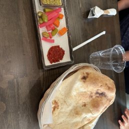 Pita and pickles /dip that comes with every meal! The pita was so good! Pita and pickles /dip that comes with every meal! The pita was so good!