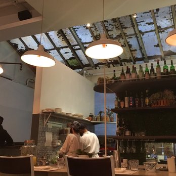 maman - Back of the restaurant. Love the windows and the open kitchen! - Bakeries Near Me - New York, New York