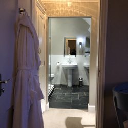 Château Rhianfa - Master bath with shower and water view.
