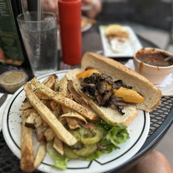 Waxy O'Connor's - Irish sausage sandwich with cheese, mushrooms, and a side of chili - Irish Near Me - San Antonio, Texas Waxy O'Connor's - Irish sausage sandwich with cheese, mushrooms, and a side of chili - Irish Near Me - San Antonio, Texas