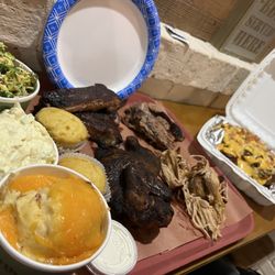 B&B BBQ - Hog Plate (Ribs, Brisket, pulled pork, half chicken) Potato salad broccoli salad 2x baked potato casserole Loaded chilli cheese fries