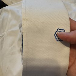 Majestic Cleaners - Dirt on cuff. This shirt did not look washed at all.