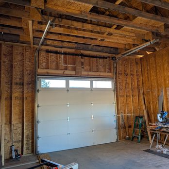 One Clear Choice Garage Doors - Highlifted door in my shop. - Garage Door Services Near Me - Loveland, Colorado One Clear Choice Garage Doors - Highlifted door in my shop. - Garage Door Services Near Me - Loveland, Colorado