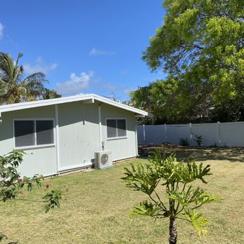 Unlimited Landscape Hawaii - Before shot of back of house. - Lawn Services Near Me