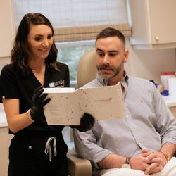 Carolina Facial Plastics - Courtney with a patient