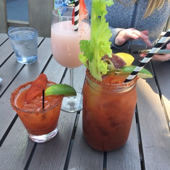 Lighthouse - A huge Bloody Mary (I took half to go and it filled the entire to go cup so it's really 2 drinks), a froze and the spicy mango margarita - Breakfast & Brunch Near Me - Newport Beach, California