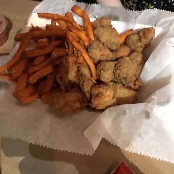Crafty Crab - Fried Friend Oyster Basket with sweet potato fries - Seafood Near Me - Orlando, Florida Crafty Crab - Fried Friend Oyster Basket with sweet potato fries - Seafood Near Me - Orlando, Florida