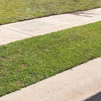 Browns Committed Landscaping - a fire hydrant on a sidewalk - Landscaping Near Me