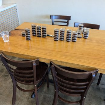Seoul Bap - (Soy?) sauces on the large table to the right. No, I'm not sure why they were there - Korean Near Me - Carson, California