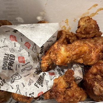 Bonchon Elk Grove - a box of fried chicken wings - Korean Near Me - Elk Grove, California