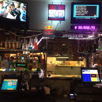 Endzone - a bar with a lot of bottles of alcohol - Sports Bars Near Me - Woodburn, Oregon Endzone - a bar with a lot of bottles of alcohol - Sports Bars Near Me - Woodburn, Oregon