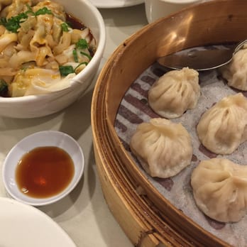 Dumpling Kitchen - Basket of xiaolongbao and bowl of wontons in chili oil. - Chinese Near Me - San Francisco, California Dumpling Kitchen - Basket of xiaolongbao and bowl of wontons in chili oil. - Chinese Near Me - San Francisco, California