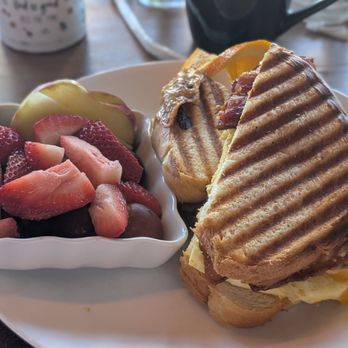 Savory Cafe - Panini with egg, cheese and bacon with a side of fruits - Breakfast & Brunch Near Me - Woodland, California Savory Cafe - Panini with egg, cheese and bacon with a side of fruits - Breakfast & Brunch Near Me - Woodland, California