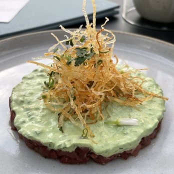 North Fork Table & Inn - Beef Tartare (topped with an avocado cream and garnished with frizzled onions) - New American Near Me - Southold, New York North Fork Table & Inn - Beef Tartare (topped with an avocado cream and garnished with frizzled onions) - New American Near Me - Southold, New York
