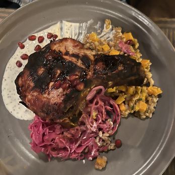 Rappahannock - Pork chop with red cabbage - Bars Near Me - Richmond, Virginia