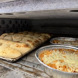 Homemade bread and baked ziti