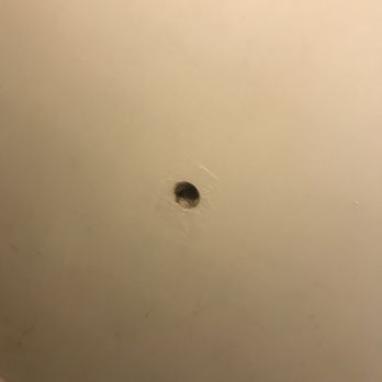 Travel Inn - Hole behind bathroom door - Hotels Near Me - Susanville, California Travel Inn - Hole behind bathroom door - Hotels Near Me - Susanville, California