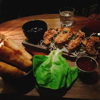 Arbella - Egg rolls ($11, front) came w/lettuce wraps & sweet chili dipping sauce. Korean Fried Chicken ($15, back) was DELISH, the house specialty! - Tapas/Small Plates Near Me - Chicago, Illinois