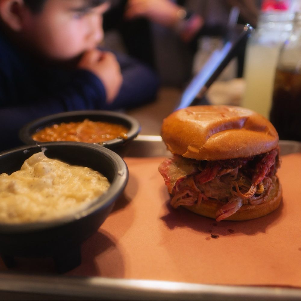Nick's Smokehouse and Cafe - Pulled pork Sandwich, mashed potatoes and baked beans. - Barbeque Near Me - Parowan, Utah Nick's Smokehouse and Cafe - Pulled pork Sandwich, mashed potatoes and baked beans. - Barbeque Near Me - Parowan, Utah