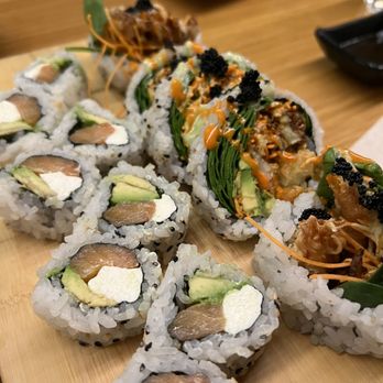 Komé - Philly roll (L) Tarantula (R) - Japanese Near Me - Austin, Texas Komé - Philly roll (L) Tarantula (R) - Japanese Near Me - Austin, Texas