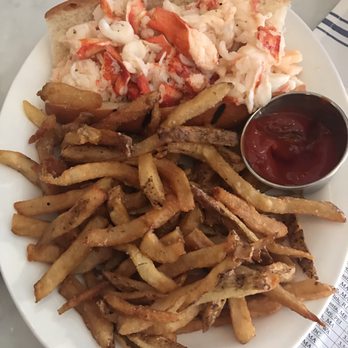 Neptune Oyster - Lobster Roll with butter. Even the fries are perfect. - Seafood Near Me - Boston, Massachusetts Neptune Oyster - Lobster Roll with butter. Even the fries are perfect. - Seafood Near Me - Boston, Massachusetts