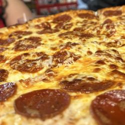 Authentic New York Pizza - it's been a while since i ate here. it's really good.. the wings are okay. and the drinks were perfect.