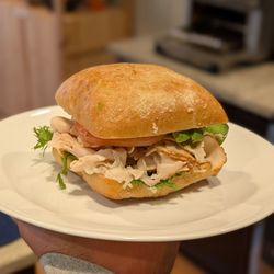 Next Chapter Cafe - Chicken Avocado Ciabatta Sandwich (minus cheese) - hefty, delicious, filling! Comes with a salad or bag of chips! IG - @bilalandjesseatfood