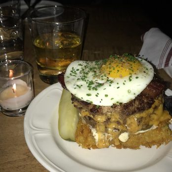 Au Cheval - Gluten free double. Potato hash bun pictured below patties. - Bars Near Me - Chicago, Illinois Au Cheval - Gluten free double. Potato hash bun pictured below patties. - Bars Near Me - Chicago, Illinois