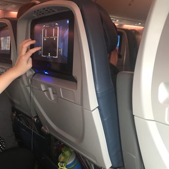 Delta Air Lines - My little neighbor was enjoying his free games - Airlines Near Me - Seattle, Washington