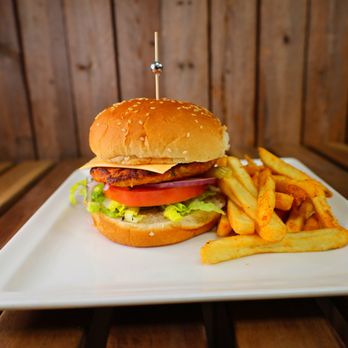 Ruzana - a hamburger and fries on a plate - Kebab Near Me - Brooklyn, New York Ruzana - a hamburger and fries on a plate - Kebab Near Me - Brooklyn, New York
