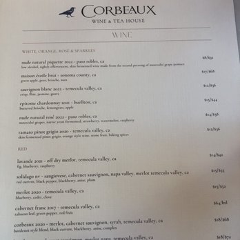Corbeaux Wine & Tea House - A French music playing  So cute here - Wine Bars Near Me - Temecula, California