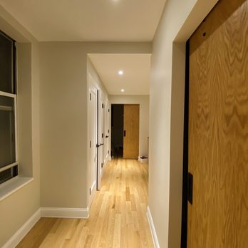 LEY Home Improvements - a hallway with wood floors - General Contractors Near Me - Queens, New York